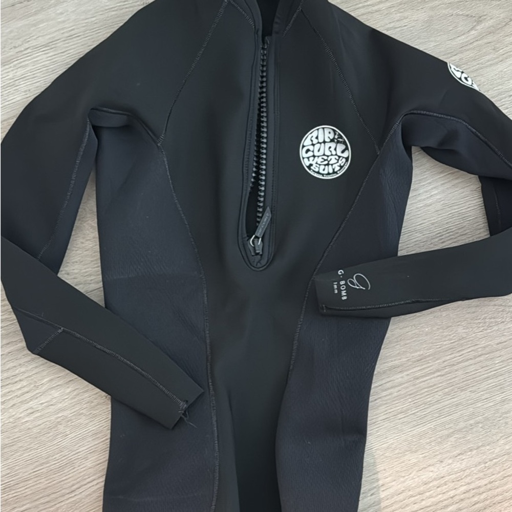 Rip Curl Black Rashguard and shorts